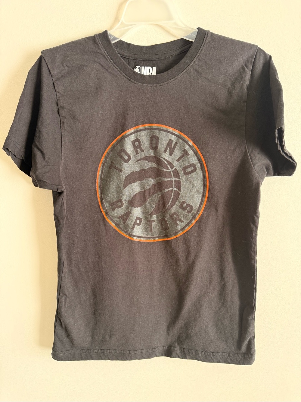 NBA Black Toronto Raptors Circular Logo Tee with Orange Accent